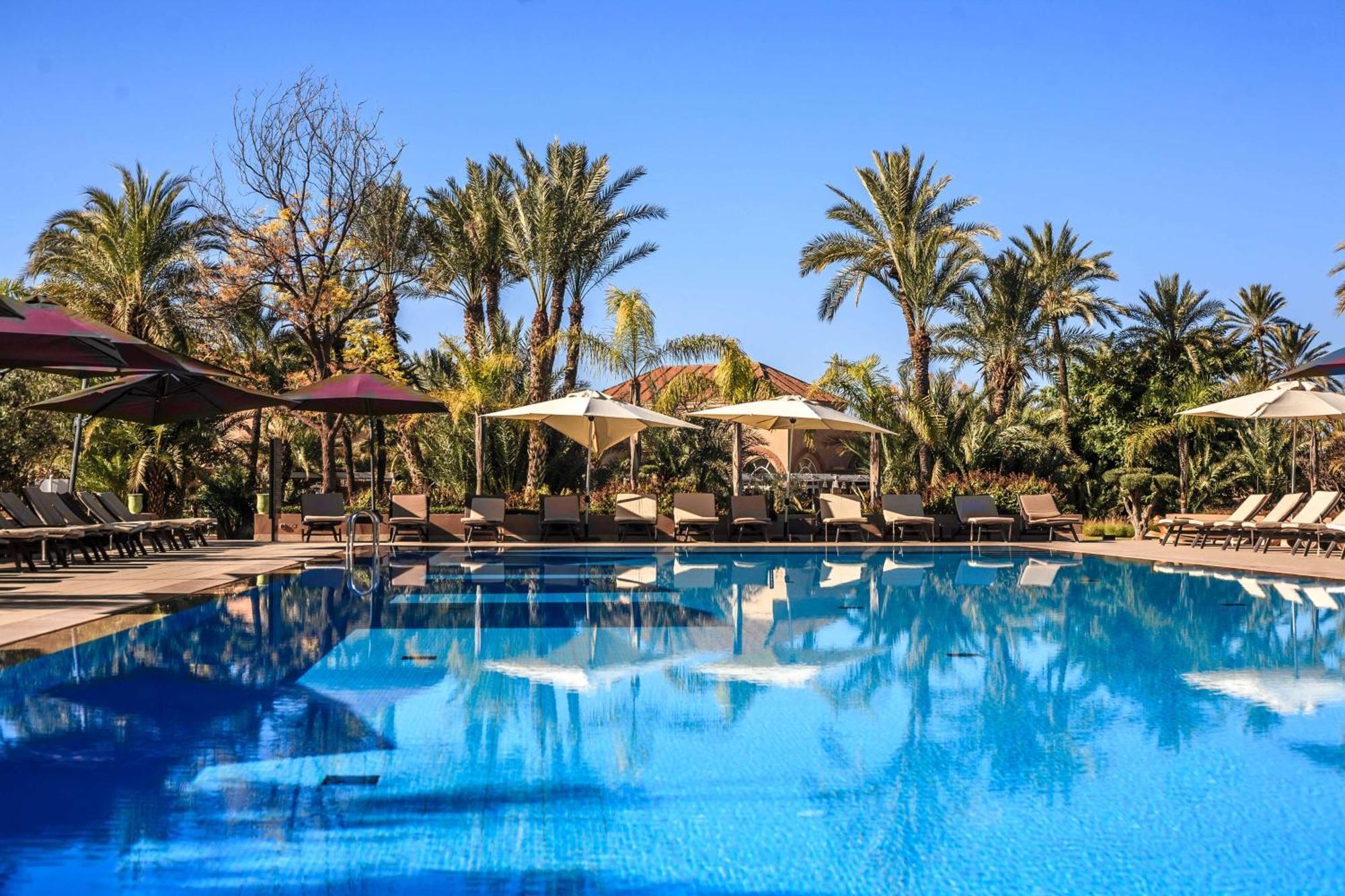 Barcelo Palmeraie Oasis Resort (Adults Only) Marrakesh Esterno foto The swimming pool at the hotel
